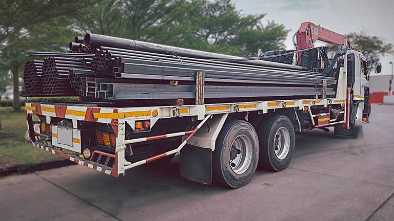 Custom Metal Fabrication - Pipes on Flatbed